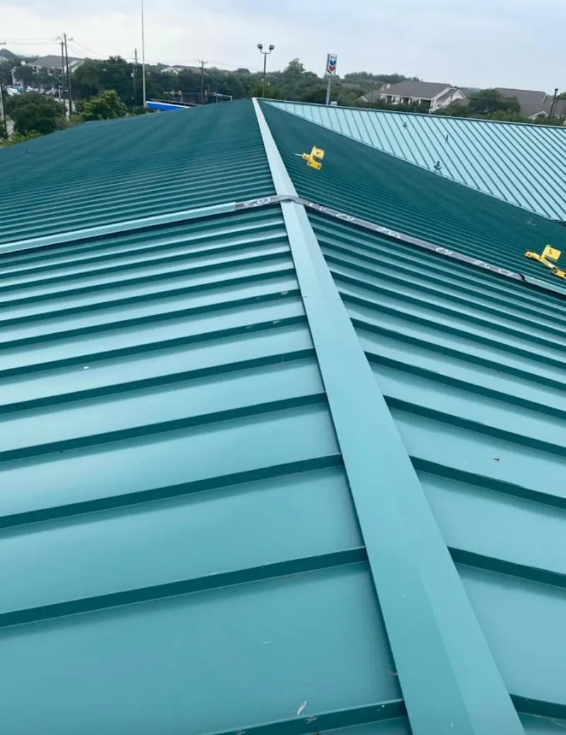 Green commercial metal roof ridge and valley for Metal Roof Repair in Lackawanna